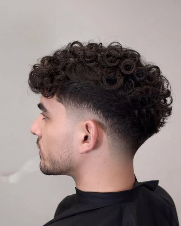Loose, Flowing Parted Curls With Taper Fade