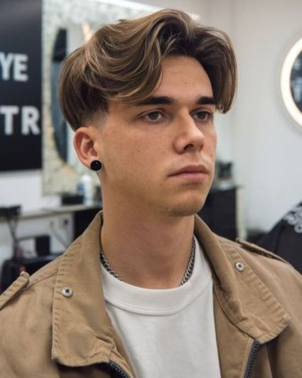 trending and popular mens middle part hairstyle
